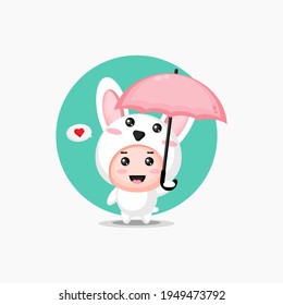 Cute rabbit carrying an umbrella