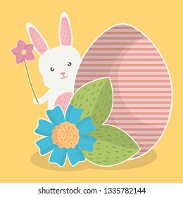 cute rabbit with easter egg painted and flowers