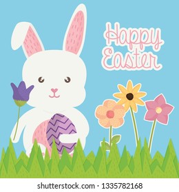 cute rabbit with easter egg painted in the landscape