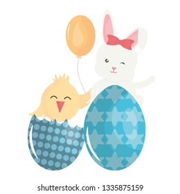 cute rabbit with easter egg painted and chick