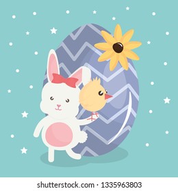 cute rabbit with easter egg painted and chick