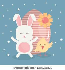 cute rabbit with easter egg painted and chick