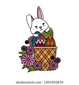 cute rabbit with easter eggs painted in basket and flowers