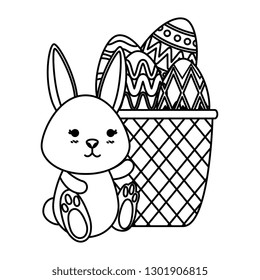 cute rabbit with easter eggs painted in basket