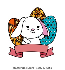 cute rabbit with easter eggs painted