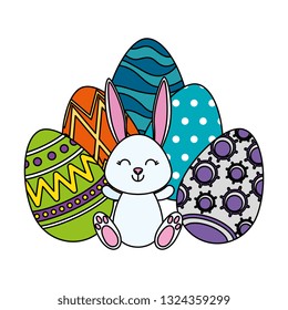 cute rabbit with easter eggs painted