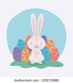 cute rabbit with easter eggs painted in the camp