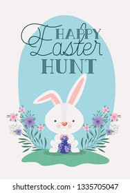 cute rabbit with egg painted and flowers in the garden