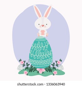 cute rabbit with egg painted and flowers in the garden