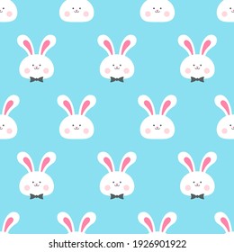 Cute rabbit face seamless pattern vector illustration. White bunny with bow tie pattern on blue background