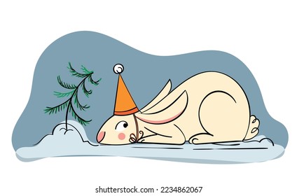 a cute rabbit in a festive hat hides behind a small Christmas tree