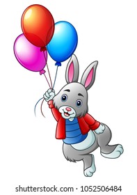Cute rabbit flying with balloons on a white background
