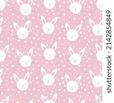 Cute rabbit heads on pink background. Seamless funny pattern