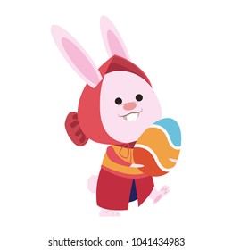 Cute rabbit holding easter egg