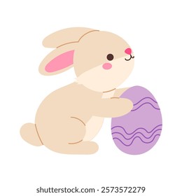 A cute rabbit holding an egg in its paws. The rabbit is sitting on the ground and he is holding the egg with care