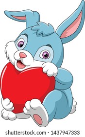 Cute rabbit holding red heart