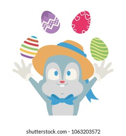 Cute rabbit joggling with easter eggs