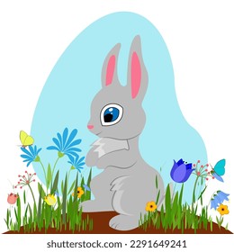 A cute rabbit is playing on the lawn. Flower field with a beautiful rabbit