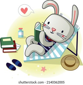 cute rabbit reading books on the beach