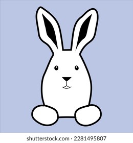 A cute rabbit is sitting on the floor 