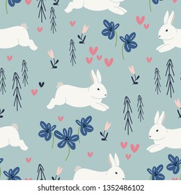 Cute rabbits and flowers seamless pattern. Spring and easter theme seamless background for nursery, baby and kids products, fabric, stationery, textile