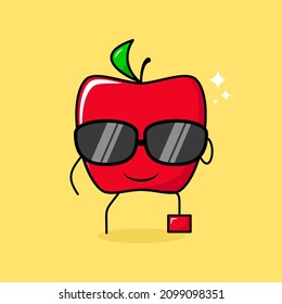 cute red apple character with smile expression, black eyeglasses, one leg raised and one hand holding glasses. green and red. suitable for emoticon, logo, mascot or sticker