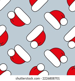 Cute red Christmas hats on gray. Seamless vector pattern. Christmas background for festive designs, textile print, wrapping, paper decorations, decors, backdrops of banners, cards, and invitations.