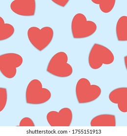 Cute red hearts with shadow on a light blue background. Seamless pattern