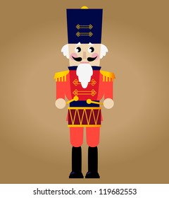 Cute red retro Nutcracker isolated on brown