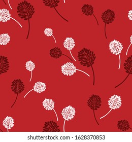 cute red seamless vector leaves pattern on red background