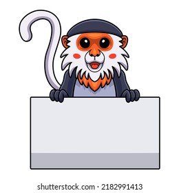 Cute red shanked douc monkey cartoon holding blank sign