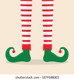 Cute red and white striped legs and green elf shoes with jingle bell. Vector illustration isolated on beige background.