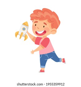 Cute Redhead Boy Playing with Toy Spacecraft Vector Illustration