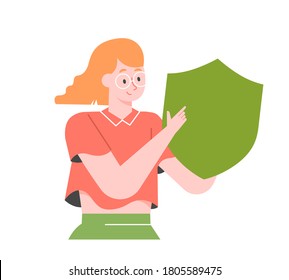 A cute redhead girl with glasses holds a green shield in her hands. Computer information personal security. Immunity protection. Vector flat illustration.