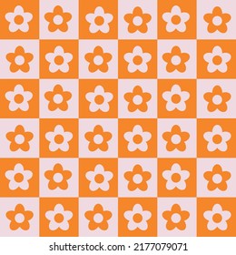 Cute retro flower seamless pattern on white and orange checkerboards. For wallpaper, stationary, posters and textile 
