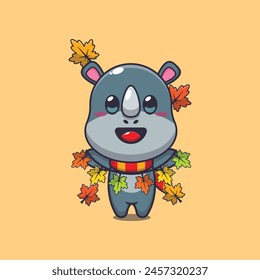 Cute rhino with autumn leaf decoration. Mascot cartoon vector illustration suitable for poster, brochure, web, mascot, sticker, logo and icon.