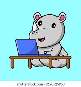 Cute Rhino Working On Laptop Cartoon Vector Icon Illustration. Flat Cartoon Concept