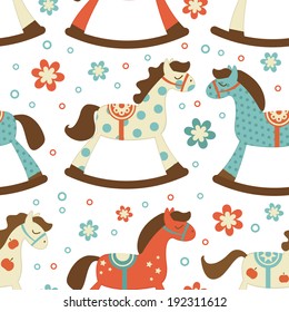 Cute rocking horses seamless background