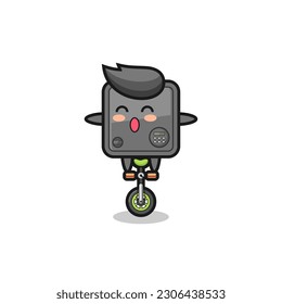 The cute safe box character is riding a circus bike , cute style design for t shirt, sticker, logo element