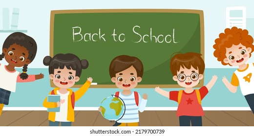 Cute schoolchildren in front of chalkboard with sign Back to school. Banner with happy pupils in classroom.