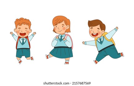 Cute schoolkids in blue uniform going to school set. Happy elementary school students with backpacks cartoon vector illustration