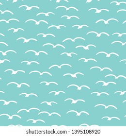 Cute seagulls flying in summer sky. Marine animal bird seamless vector background. Hand drawn sealife tile. All over print kids textiles. maritime fashion all over prints, classy nautical home decor.