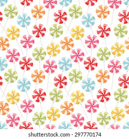 Cute seamless background with different color striped candy