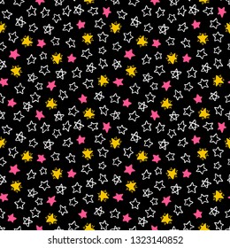 Cute seamless background of different hand-drawn stars
