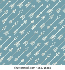 Cute seamless background with hand-drawn beige arrows on a blue background
