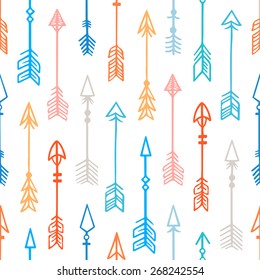 Cute seamless background with hand-drawn colorful arrows on a white background