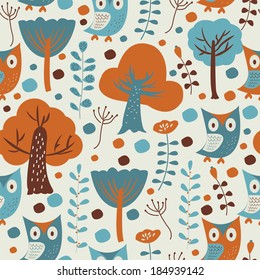 Cute seamless background with trees, flowers and owls in cartoon style.