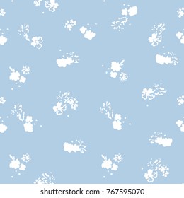 Cute seamless floral pattern. Delicate flowery background for fabric, wrapping, wallpaper. White on blue.