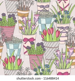 Cute seamless floral pattern. Pattern with flowers in buckets.