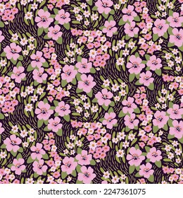 Cute seamless floral pattern, liberty ditsy print with spring botany. Pretty flower design with hand drawn meadow: small pink flowers, tiny leaves on a dark green background. Vector illustration.